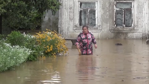 Сильный ливень обрушился на окраины и центр города Гала в пятницу 10 августа. - Sputnik Абхазия