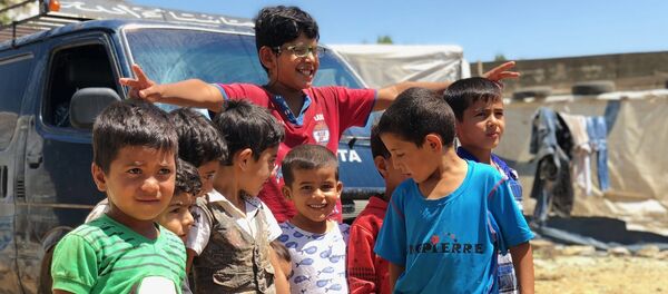 Лагеря беженцев в ливанском Бекаа Лагеря беженцев в ливанском Бекаа - Sputnik Абхазия