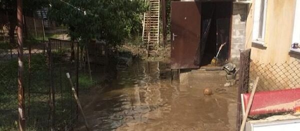 Ливневый дождь подтопил улицы и дома в Сухуме Ливневый дождь подтопил улицы и дома в Сухуме - Sputnik Абхазия