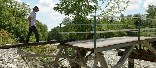 Мост в селе Джгерда, который смыло из-за проливных дождей 10 августа Мост в селе Джгерда, который смыло из-за проливных дождей 10 августа - Sputnik Абхазия