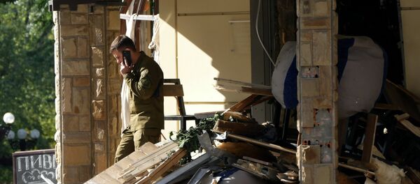 Ситуация на месте взрыва в донецком кафе Сепар - Sputnik Абхазия