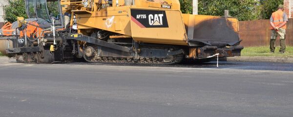 Укладка нового асфальта на улице Адлейба в Сухуме Укладка нового асфальта на улице Адлейба в Сухуме - Sputnik Абхазия