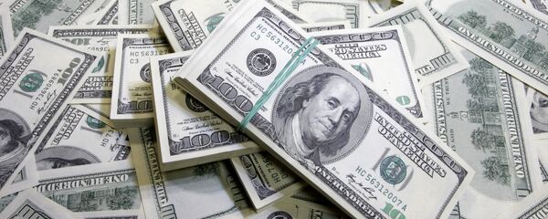 Денежные купюры: доллары США. Денежные купюры: доллары США. - Sputnik Абхазия