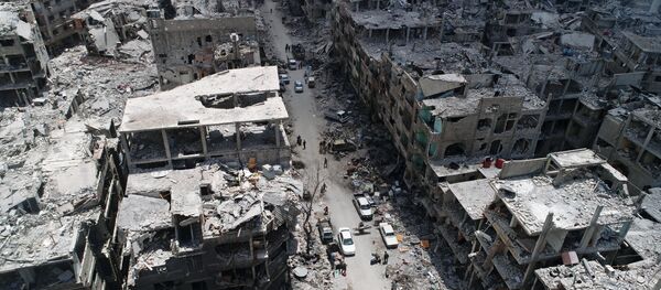 Освобожденный от боевиков лагерь беженцев «Ярмук» на юге Дамаска Освобожденный от боевиков лагерь беженцев «Ярмук» на юге Дамаска - Sputnik Абхазия