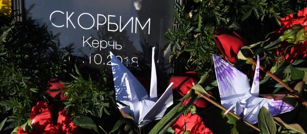 Акции памяти о погибших при нападении на колледж в Керчи Акции памяти о погибших при нападении на колледж в Керчи - Sputnik Абхазия