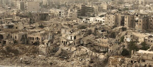 Разрушенные и поврежденные здания в Алеппо в результате военных действий - Sputnik Аҧсны