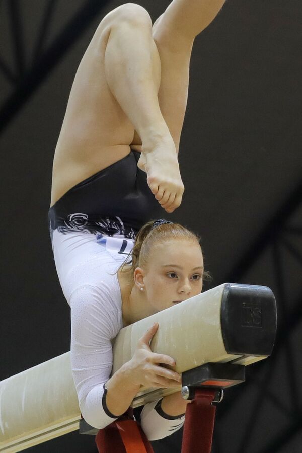 Швейцарская гимнастка Леони Майер на чемпионате мира по спортивной гимнастике в Дохе - Sputnik Абхазия