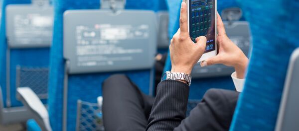 Пассажир самолета. Архивное фото Пассажир самолета. Архивное фото - Sputnik Абхазия