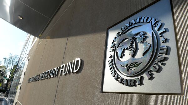 Табличка с логотипом Международного валютного фонда на стене здания МВФ. - Sputnik Абхазия