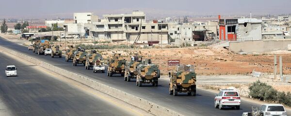 Турецкие войска на главной автомагистрали между Дамаском и Алеппо, недалеко от города Саракиб в северной провинции Идлиб, 29 августа 2018 года - Sputnik Абхазия