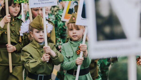 Участники акции Бессмертный полк, проходящего в рамках детского парада Победы «Дорогами памяти» в Иванове - Sputnik Абхазия