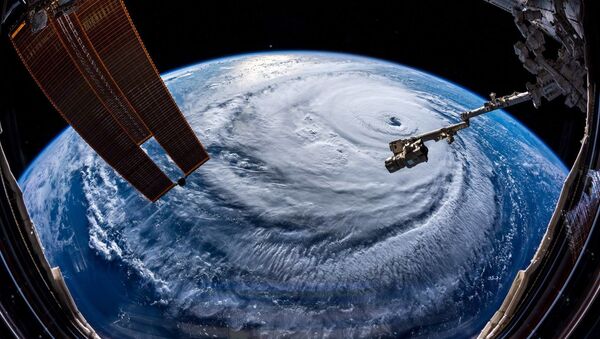 Ураган Флоренс, сфотографированный астронавтом Александром Герстом с МКС - Sputnik Абхазия