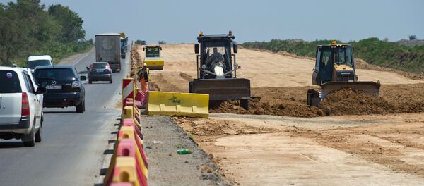 Строительство автомобильных подходов к мосту через Керченский пролив Строительство автомобильных подходов к мосту через Керченский пролив - Sputnik Абхазия