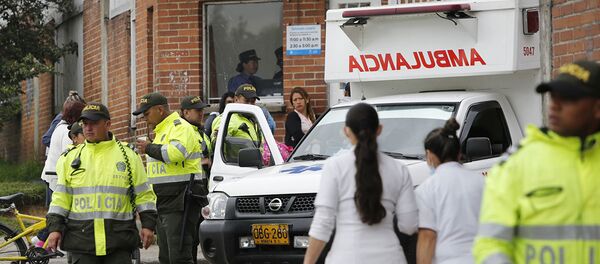 Сотрудники полиции и скорой помощи в Боготе, Колумбия. Архивное фото Сотрудники полиции и скорой помощи в Боготе, Колумбия. Архивное фото - Sputnik Абхазия