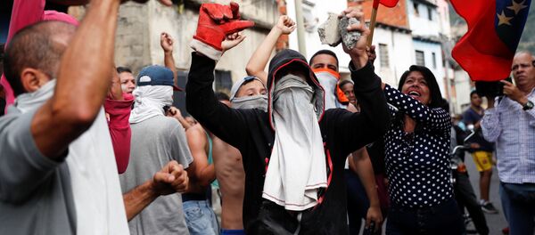 Протестующие в Каракасе, Венесуэла Протестующие в Каракасе, Венесуэла - Sputnik Абхазия