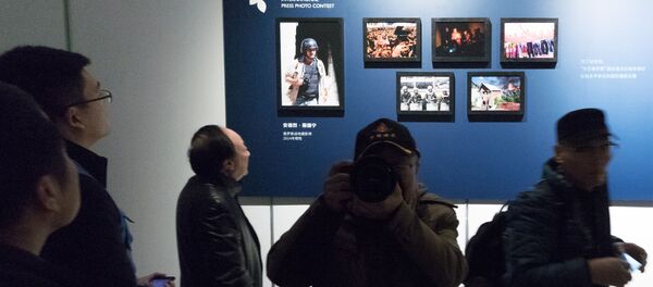 Выставка победителей конкурса им. Андрея Стенина в Вэйхае Выставка победителей конкурса им. Андрея Стенина в Вэйхае - Sputnik Аҧсны