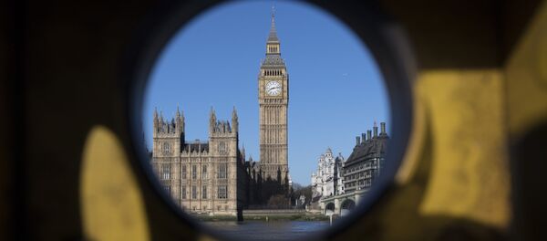 Вид с противоположного берега реки Темза на Вестминстерского дворца в Лондоне. Вид с противоположного берега реки Темза на Вестминстерского дворца в Лондоне. - Sputnik Абхазия