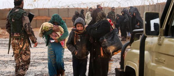 Сирийские беженцы во временном лагере Рукбан, архивное фото Сирийские беженцы во временном лагере Рукбан, архивное фото - Sputnik Аҧсны