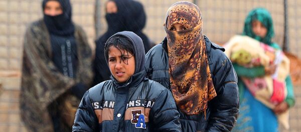 Сирийские беженцы в лагере Рукбан . Архивное фото - Sputnik Абхазия