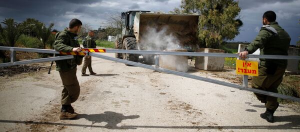 Израильские солдаты возле границы с сектором Газа на юге Израиля, 25 марта 2019 года Израильские солдаты возле границы с сектором Газа на юге Израиля, 25 марта 2019 года - Sputnik Абхазия