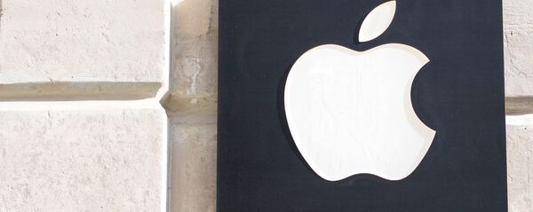 Знак Apple на фасаде дома Знак Apple на фасаде дома - Sputnik Абхазия