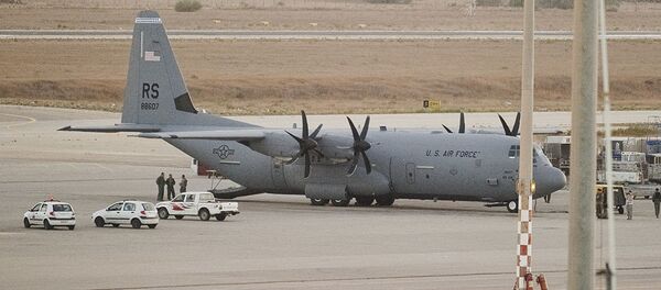 Американский военно-транспортный самолет C-130 Hercules в аэропорту Триполи, Ливия. Архивное фото Американский военно-транспортный самолет C-130 Hercules в аэропорту Триполи, Ливия. Архивное фото - Sputnik Абхазия