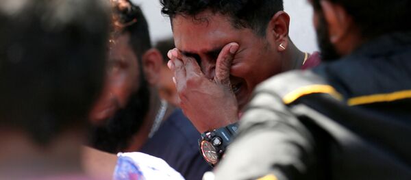 Родственники погибших в результате взрыва у церкви в Шри-Ланке, 21 апреля 2019 - Sputnik Абхазия