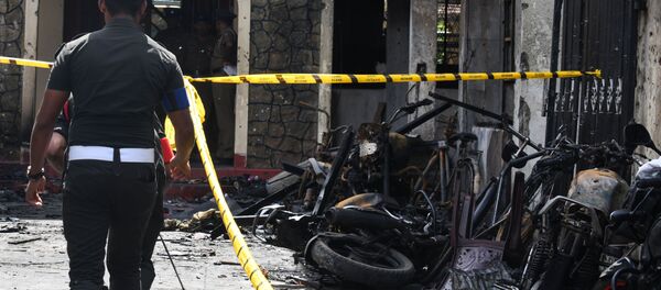 Полицейский на месте взрыва на Шри-Ланке - Sputnik Абхазия