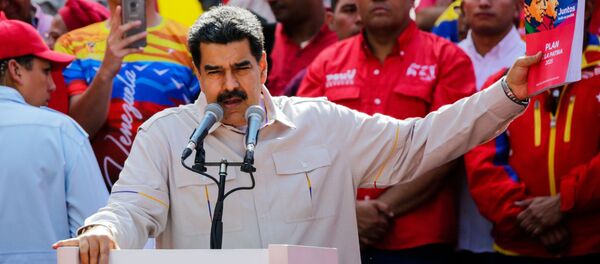 Акция в поддержку президента Венесуэлы Н. Мадуро Акция в поддержку президента Венесуэлы Н. Мадуро - Sputnik Абхазия