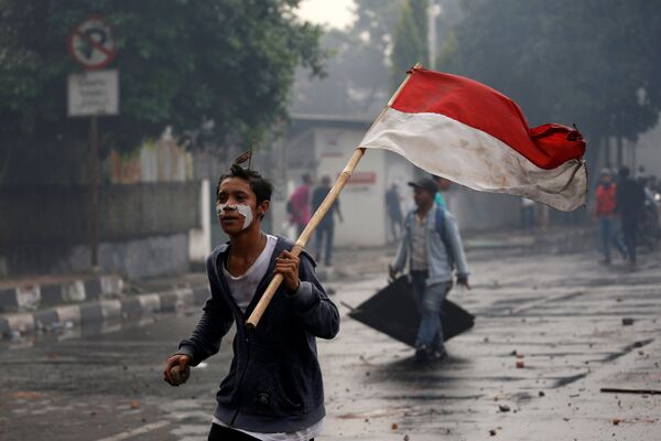 Акция протеста после объявления официальных результатов выборов в Джакарте, Индонезия - Sputnik Абхазия