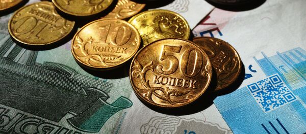 Монеты номиналом 50 и 10 копеек. - Sputnik Абхазия