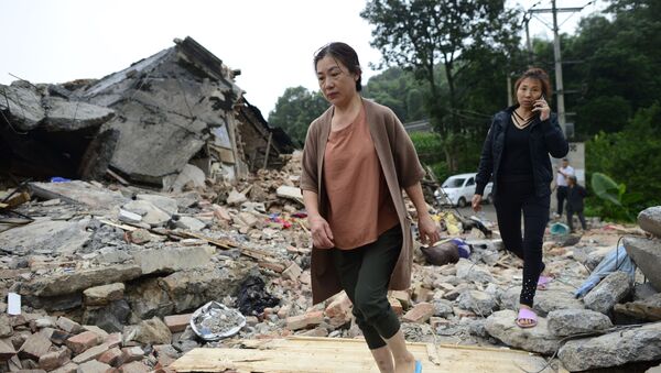 Разрушенные в результате землетрясения дома в городе Ибин, провинция Сычуань, Китай - Sputnik Абхазия