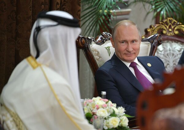 Президент РФ Владимир Путин во время встречи с эмиром Катара Тамимом бен Хамадом Аль Тани на полях саммита Совещания по взаимодействию и мерам доверия в Азии - Sputnik Абхазия