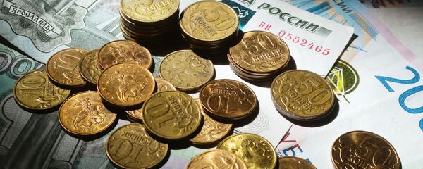 Монеты номиналом 50 и 10 копеек. С 2018 года Центральный банк РФ перестал выпускать в обращение монеты номиналом 1, 5, 10, 50 копеек. Монеты номиналом 50 и 10 копеек. С 2018 года Центральный банк РФ перестал выпускать в обращение монеты номиналом 1, 5, 10, 50 копеек. - Sputnik Абхазия