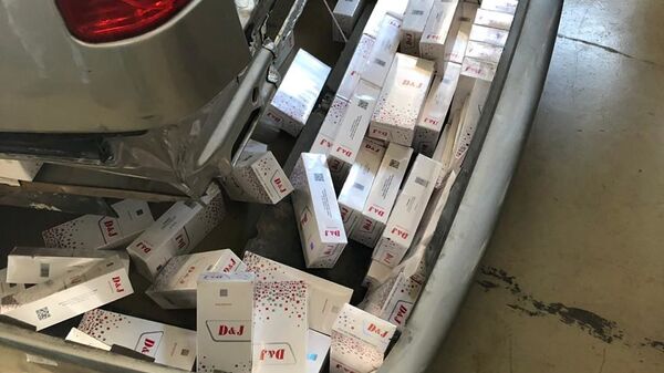 Автомобиль, в котором перемещалась незаконная табачная продукция с сокрытием - Sputnik Аҧсны