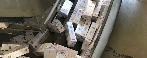 Автомобиль, в котором перемещалась незаконная табачная продукция с сокрытием Автомобиль, в котором перемещалась незаконная табачная продукция с сокрытием - Sputnik Аҧсны