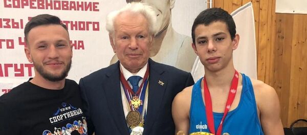 Боксер Анри Аршба на турнире Бориса Лагутина в Москве (справа) Боксер Анри Аршба на турнире Бориса Лагутина в Москве (справа) - Sputnik Абхазия