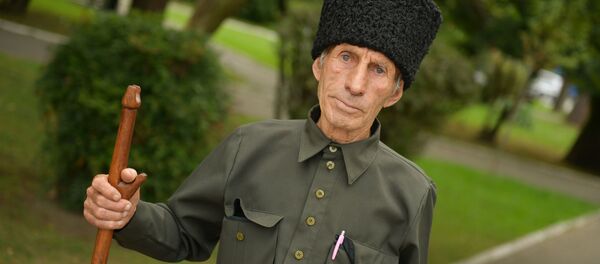 Восьмидесятилетний житель села Блабырхуа Хирбей Барциц Восьмидесятилетний житель села Блабырхуа Хирбей Барциц - Sputnik Абхазия