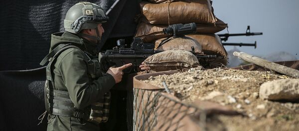 Военнослужащий турецкой армии на боевой позиции в Сирии. Архивное фото Военнослужащий турецкой армии на боевой позиции в Сирии. Архивное фото - Sputnik Абхазия
