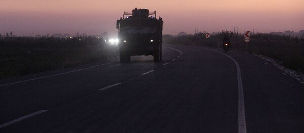 Стягивание турецкой техники к границе с Сирией Стягивание турецкой техники к границе с Сирией - Sputnik Абхазия