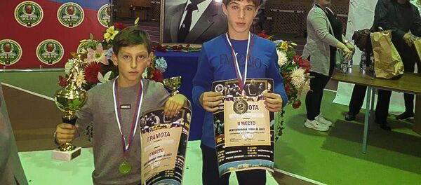Рамин Кокория и Ринат Бения с наградами  Рамин Кокория и Ринат Бения с наградами  - Sputnik Абхазия