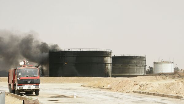 Бункеры с нефтью после теракта, совершенного боевиками ИГИЛ в Сирии  - Sputnik Абхазия