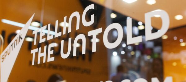 Слоган Telling the untold на студии международного информационного агентства и радио Sputnik Слоган Telling the untold на студии международного информационного агентства и радио Sputnik - Sputnik Абхазия