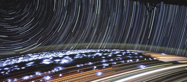 Снимок Земли с борта МКС на длинной выдержке Снимок Земли с борта МКС на длинной выдержке - Sputnik Абхазия