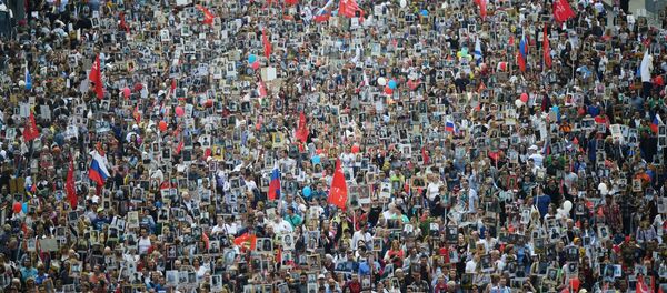 Участники акции Бессмертный полк в Москве Участники акции Бессмертный полк в Москве - Sputnik Аҧсны