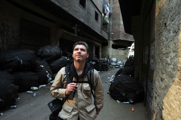 Фотокорреспондент Андрей Стенин на улице Каира - Sputnik Абхазия