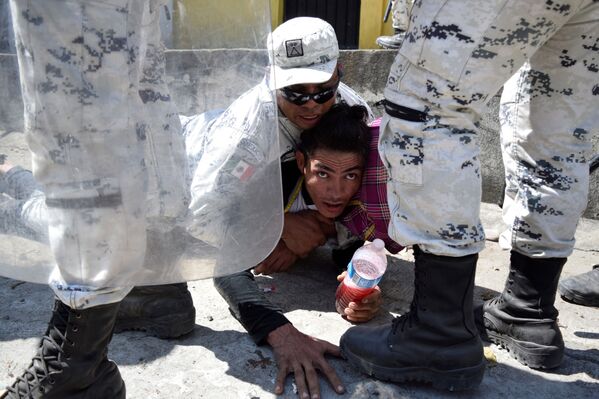 Задержание мигранта недалеко от границы между Гватемалой и Мексикой - Sputnik Абхазия