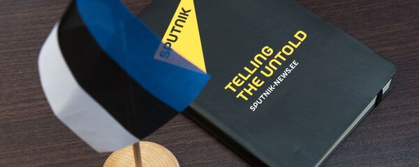 Блокнот с символикой информационного агентства Sputnik. Блокнот с символикой информационного агентства Sputnik. - Sputnik Аҧсны