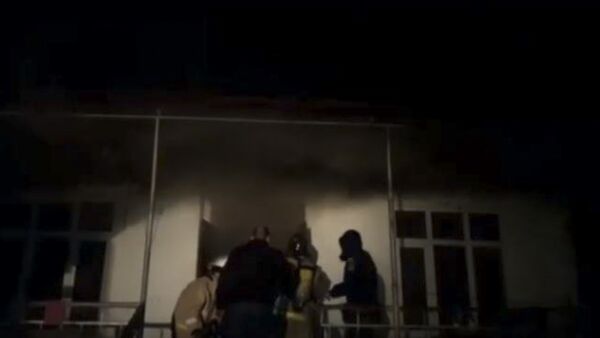 Пожар в доме по улице Заречной в городе Сухуме - Sputnik Аҧсны