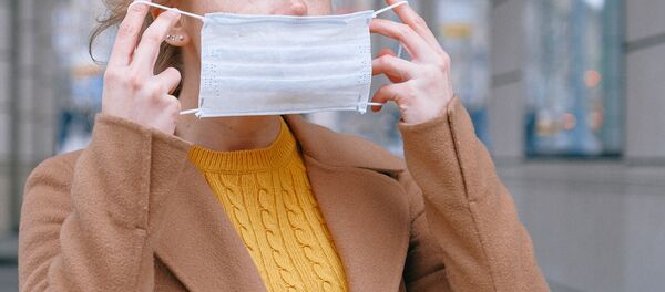 Девушка с маской Девушка с маской - Sputnik Аҧсны